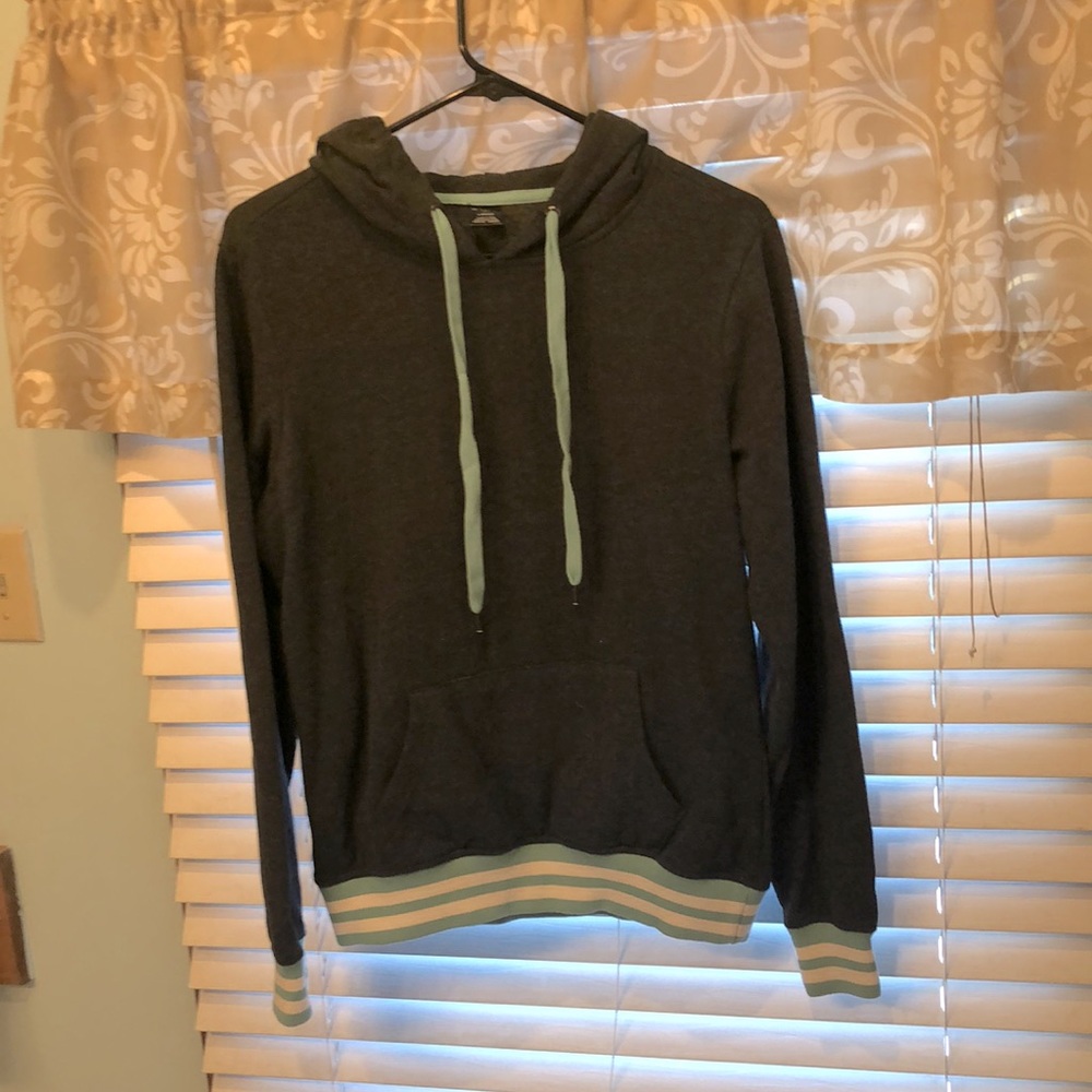 Womens dark grey, light green and white pullover sweatshirt.